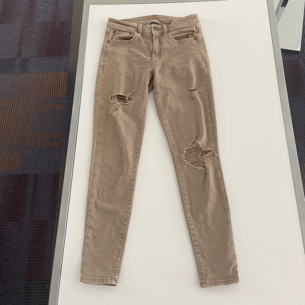 Khaki American Eagle ripped skinny jeans